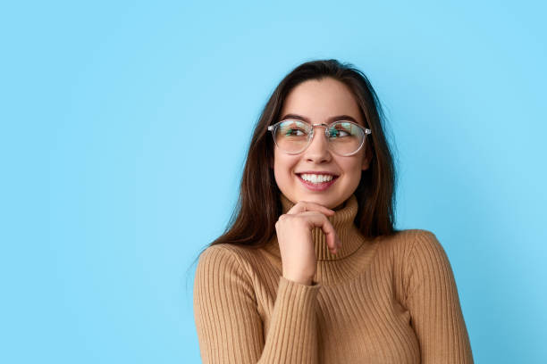 istock Dreamy teenager looking away 1162390897