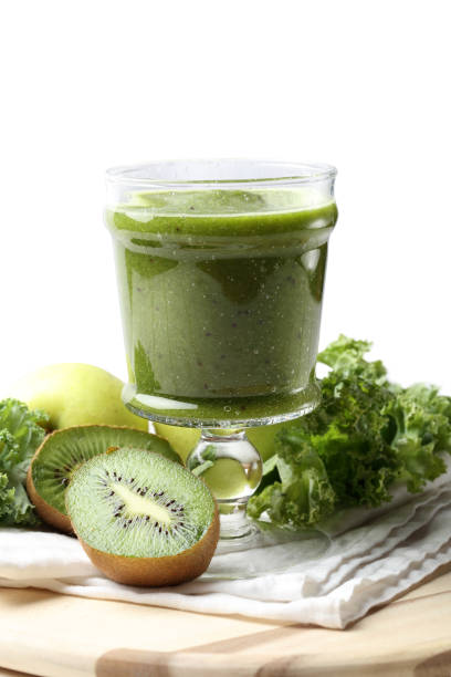 istock Green detox smoothie: kale, green apples, kiwi and date syrup 1162391389