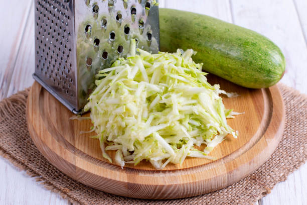 istock Grated zucchini with grater 1162392359