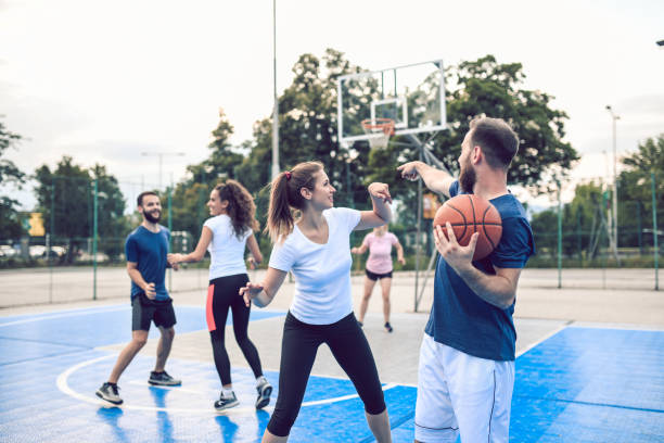 istock Basketball Coach Showing Exercises To Students 1162395827