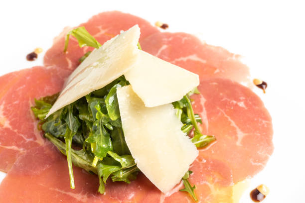 Beef carpaccio with arugula salad and parmigiano cheese