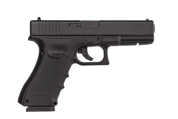 istock Black gun pistol isolated on white background 1162399954