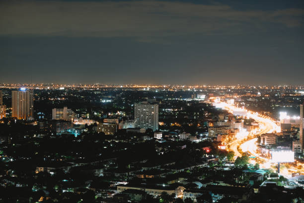 istock City view at night with beautiful lights with grain. 1162400062
