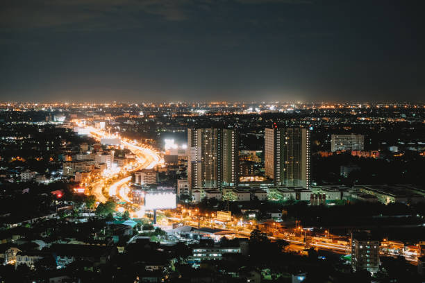 istock City view at night with beautiful lights with grain. 1162400077