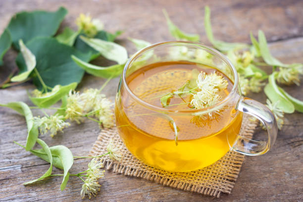 istock Cup of fresh herbal tea with linden blossom 1162404044