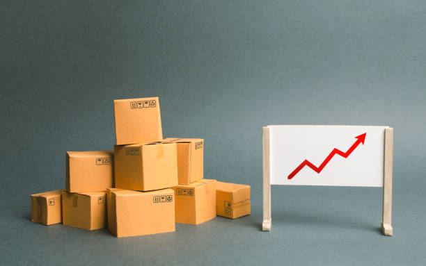 istock Plenty of cardboard boxes and whiteboard with red positive trend chart. Increasing consumer demand. rate growth of production of goods and products, increasing economic indicators. Trade balance 1162405555