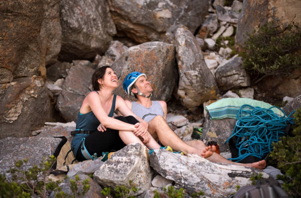istock Mountain climbers relaxing after the climb 1162406040