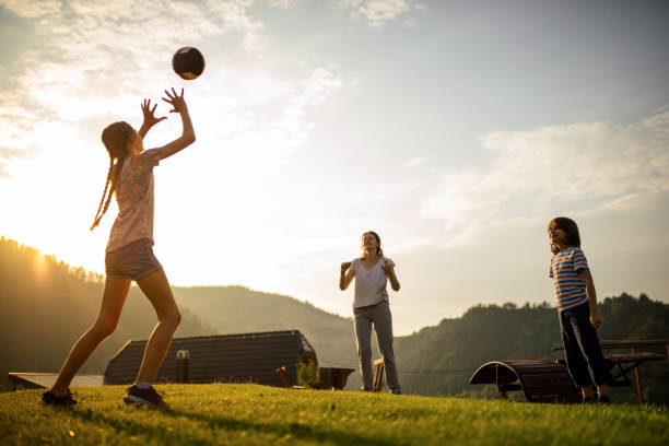 istock Mother playing volleyball with her son 1162407142