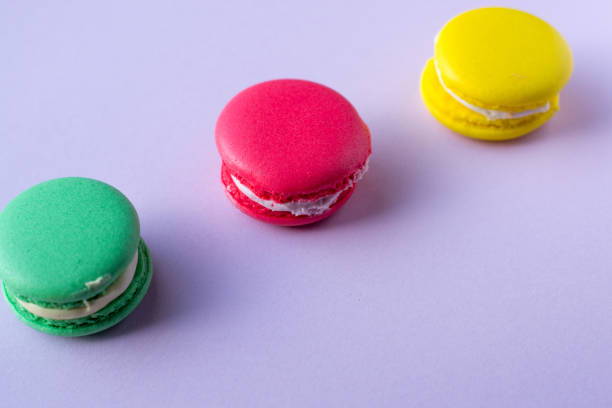 istock Close-up shot of colored macaroons in different position 1162408149