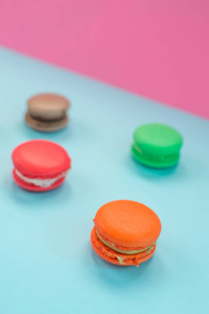 istock Close-up shot of colored macaroons in different position 1162408168