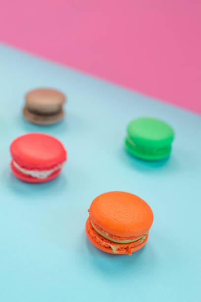 istock Close-up shot of colored macaroons in different position 1162408178