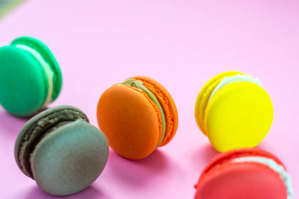 istock Close-up shot of colored macaroons in different position 1162410132
