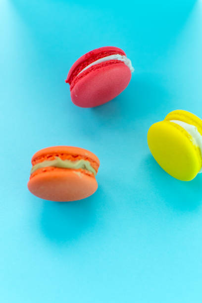 istock Close-up shot of colored macaroons in different position 1162413259