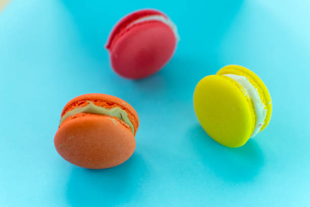 istock Close-up shot of colored macaroons in different position 1162413295