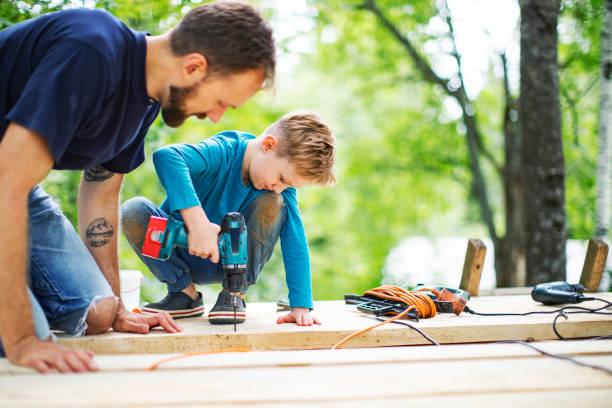 istock Father and son working togethe 1162414576