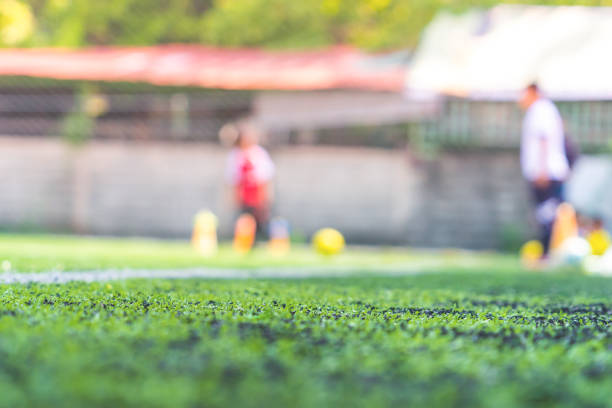 Soccer Academy field for children training blurred for background