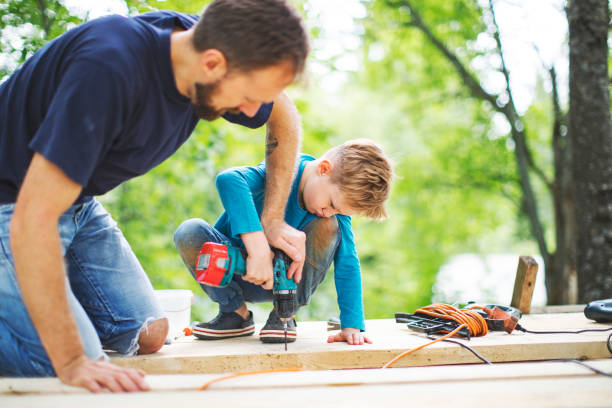 istock Father and son working togethe 1162415887
