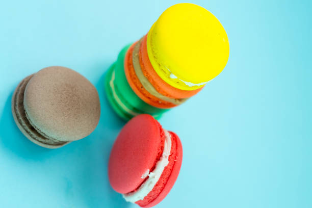 istock Close-up shot of colored macaroons in different position 1162419106