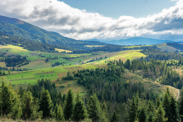 istock early autumn countryside on a cloudy day 1162419396