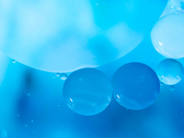istock Blue oil drops on a water surface. Abstract illustration can use as texture in design 1162421455