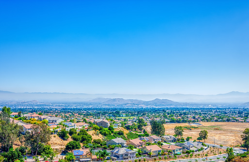 Southern California inland empire on a hot summer day with haze in the sky and room for copy text.