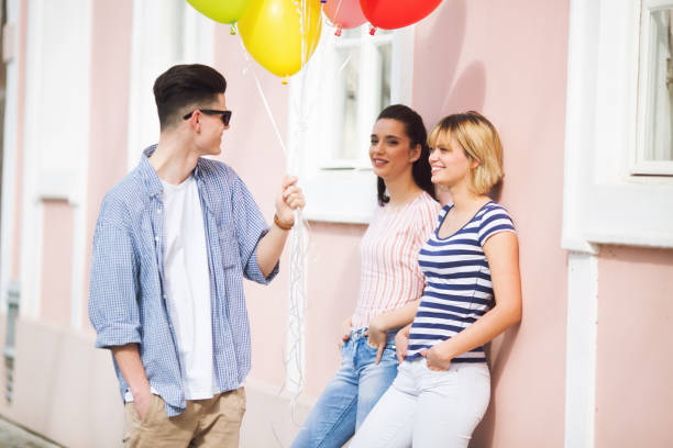 istock Three friends having fun outdoors 1162426023