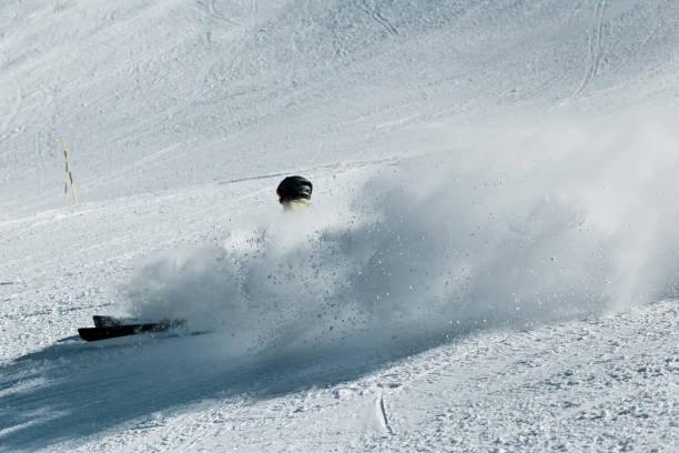 istock A skier at high speed descends from the mountain 1162428303