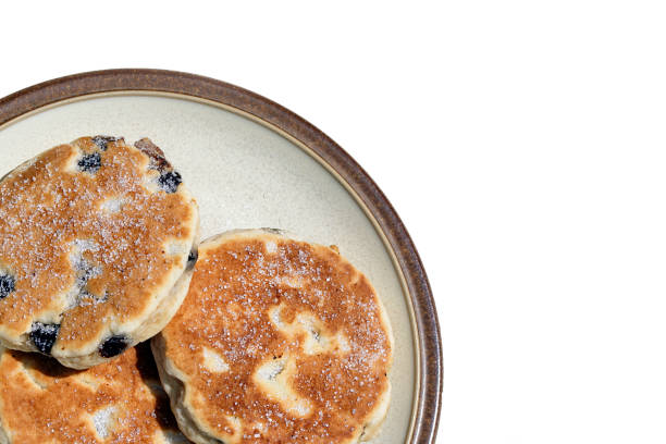 istock Close up of three Welsh Cakes on a plate. 1162428564
