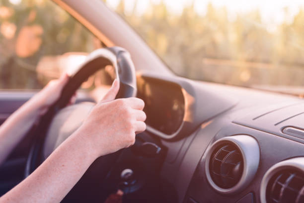 istock Driving car through countryside 1162432297