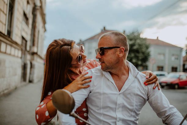 istock A couple goes on holiday with their scooter 1162436028