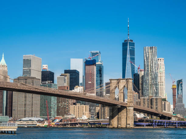 istock Brooklyn Bridge And Manhattan At Sunny Day 1162436346