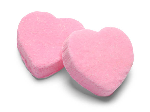 two pink valentines candy hearts - lots of candy hearts imagens e fotografias de stock