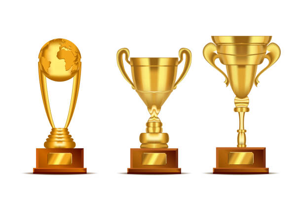 istock Set of realistic golden, trophy cup or award with text plate for champions. Sport winners cup. 1162436473