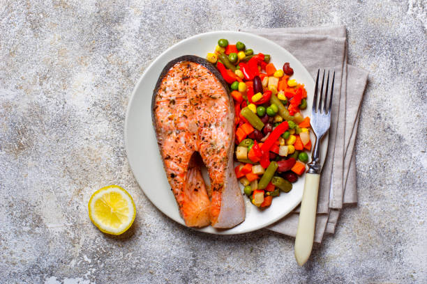 istock Baked salmon fillet with vegetables 1162439240