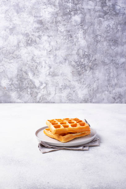 istock Waffles with strawberries and banana 1162439540