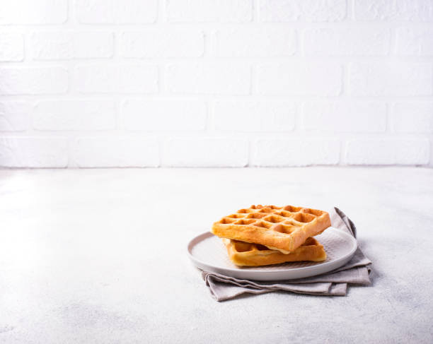 istock Waffles with strawberries and banana 1162439546