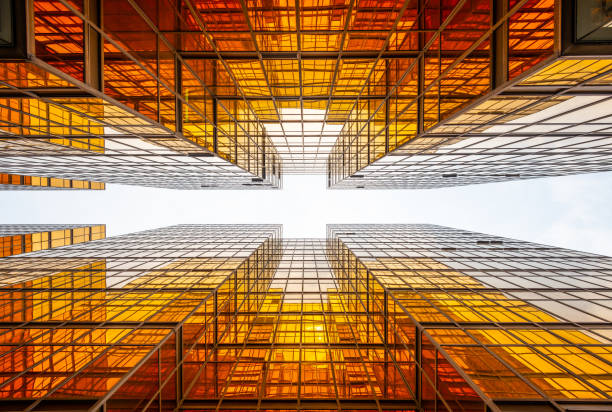 istock Bright future, finance buildings reflecting in each other, seen from below 1162440493