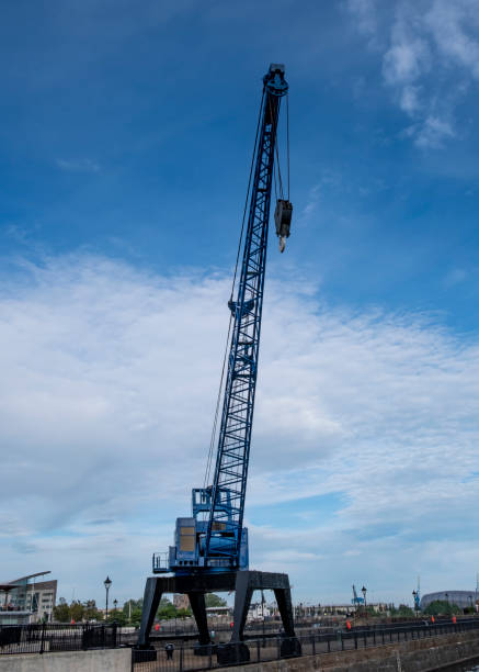 istock Silhouette of tall crane at Cardiff harbourside 1162442884
