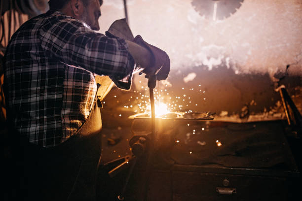 istock Senior men welding metal 1162443330