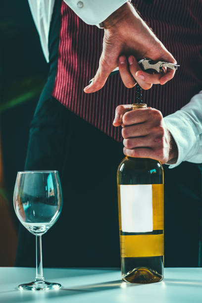 Opening wine bottle