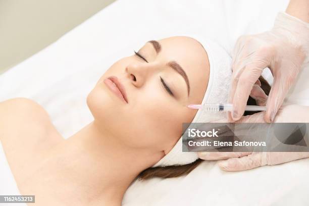 Anti Wrinkle Surgery Beauty Young Woman Injection Facial Treatment Stock Photo - Download Image Now