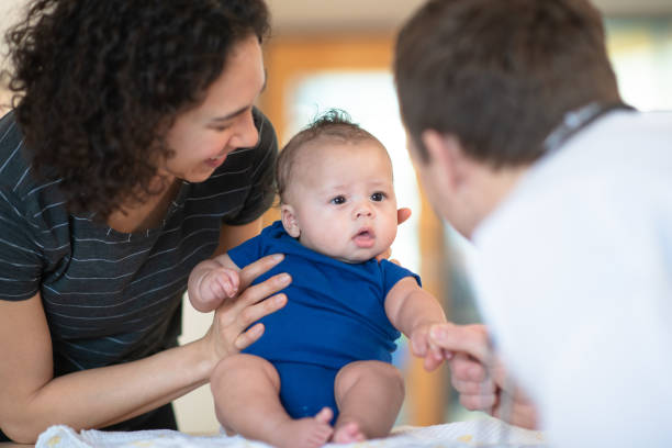 istock Mother holding her toddler 1162453220