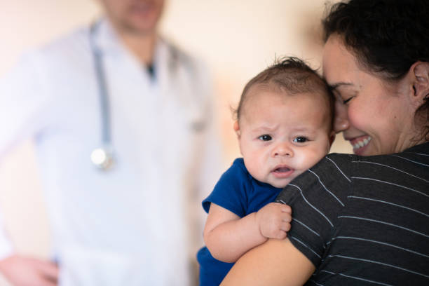 istock Mother holding her toddler 1162453231