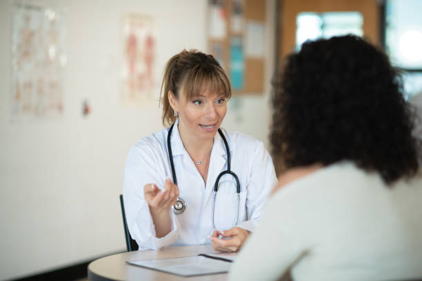 istock Doctor speaking to patient 1162453755
