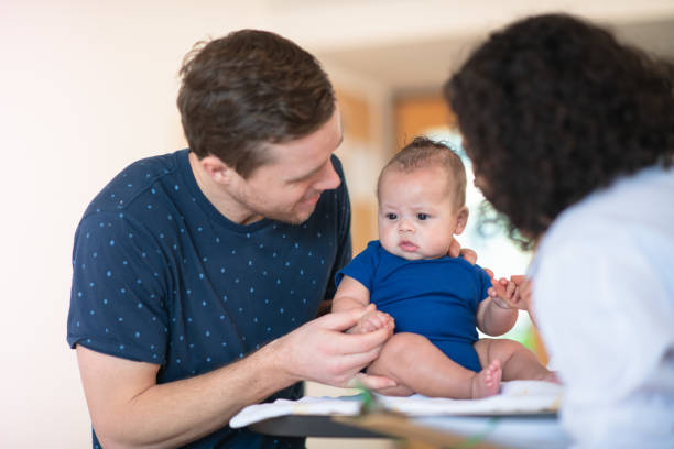 istock Doctor gives baby a checkup 1162453812