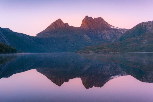 istock Cradle Mountain reflected in lake Dove at sunrise 1162454209