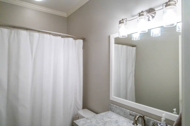 istock Small white bathroom room inside a guest house pool house. 1162456681