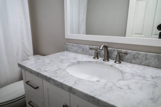 istock Small white bathroom room inside a guest house pool house. 1162456686