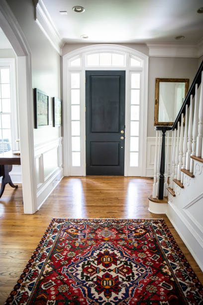 istock Interior front door hall hallway entrance to Home with Vaulted Ceilings 1162456758