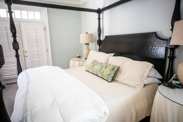 istock Master bedroom with Four-poster cherry wood bed 1162457947